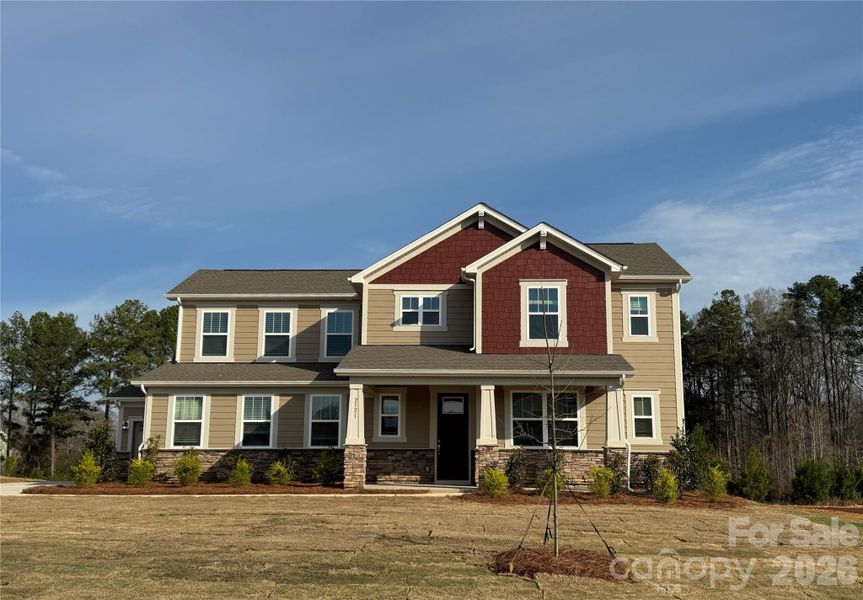 Front exterior of a new home in Blair Place, Monroe, NC, highlighting curb appeal (Image 2). Front exterior of a new home in Blair Place, Monroe, NC, highlighting curb appeal (Image 2).