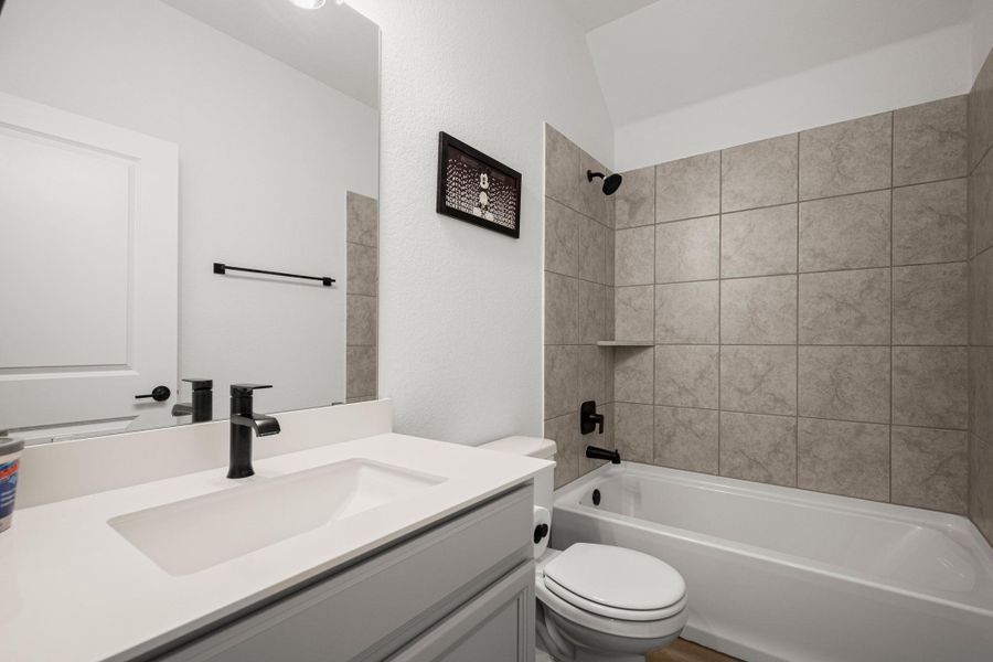 Bathroom with tub / shower combination and vanity Bathroom with tub / shower combination and vanity