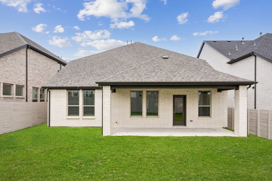 Exterior details and patio area of a home in Painted Tree Woodland West, McKinney (Image 4). Exterior details and patio area of a home in Painted Tree Woodland West, McKinney (Image 4).