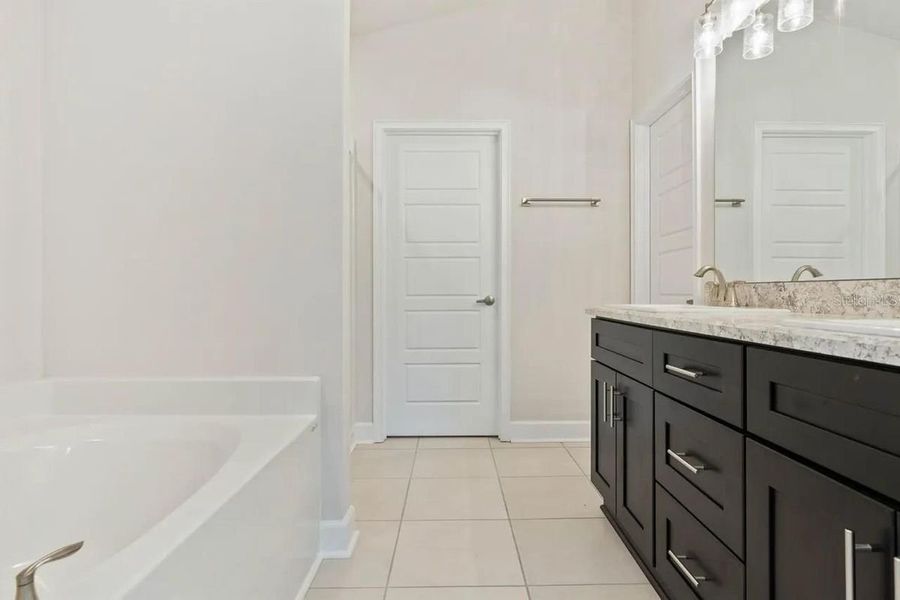 Representative furnished interior of a home built from the 1512 by Adams Homes in Winding Oaks, Weeki Wachee (Image 10).