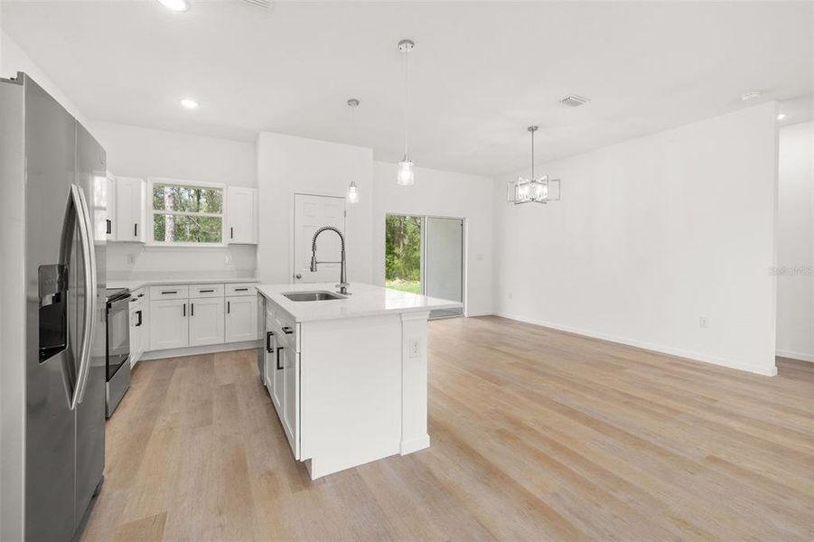 Furnished interior view inside a new home in , Dunnellon (Image 12).