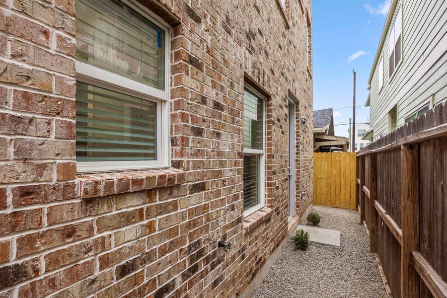 Exterior details and patio area of a home in , Houston (Image 17).