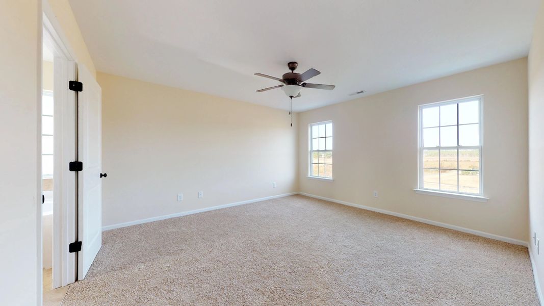 Representative unfurnished interior of a home built from the Rockbridge by Bill Clark Homes in Davenport Farms, Winterville (Image 56).