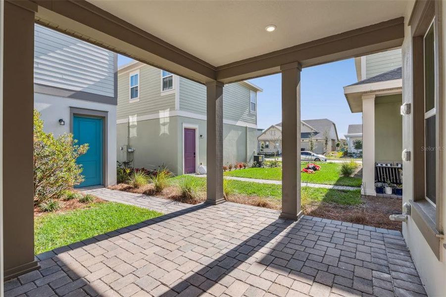 Exterior details and patio area of a home in Laureate Park (Craft Homes), Orlando (Image 4).