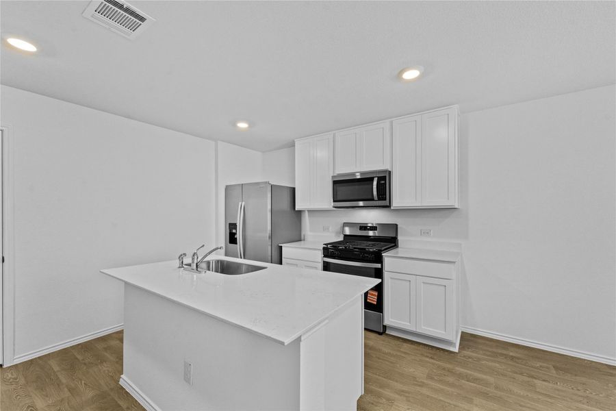 Furnished interior view inside a new home in Prairie Lakes, Buda (Image 6).