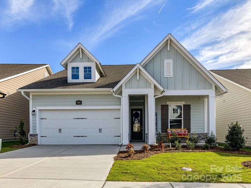Front exterior of a new home in Encore at Streamside - Classic Series, Waxhaw, NC, highlighting curb appeal (Image 32).