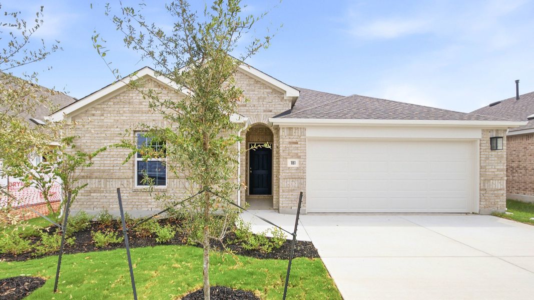 Front exterior of a new home in Infinity Square, Kyle, TX, highlighting curb appeal (Image 21).