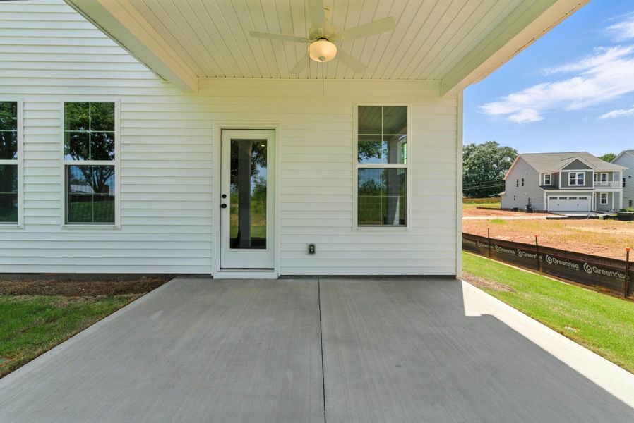 Front exterior of a new home in Six Oaks, Summerville, SC, highlighting curb appeal (Image 26).