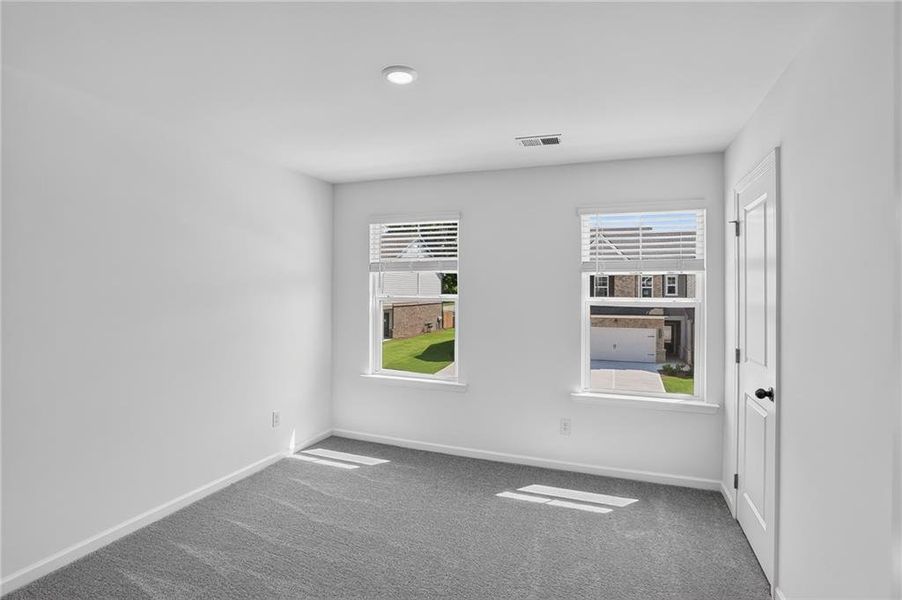 Spacious, unfurnished interior of a new home in Towns at Ivy Creek, Buford (Image 10).