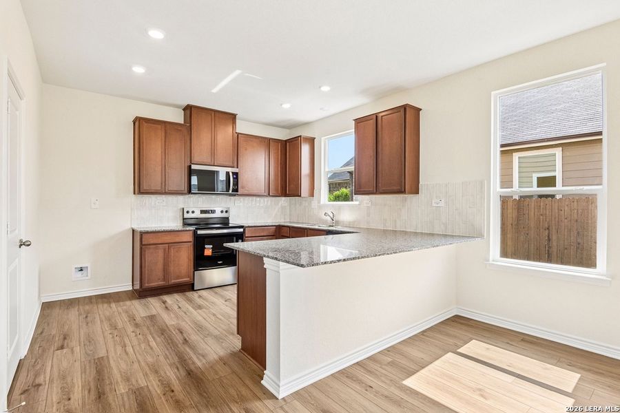 Furnished interior view inside a new home in Woodside Farms, Seguin (Image 15).