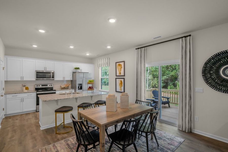 Representative furnished interior of a home built from the PENWELL by D.R. Horton in East Ridge, Ayden (Image 10).