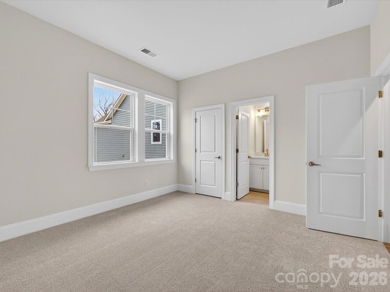Spacious, unfurnished interior of a new home in North Creek Village, Huntersville (Image 38).