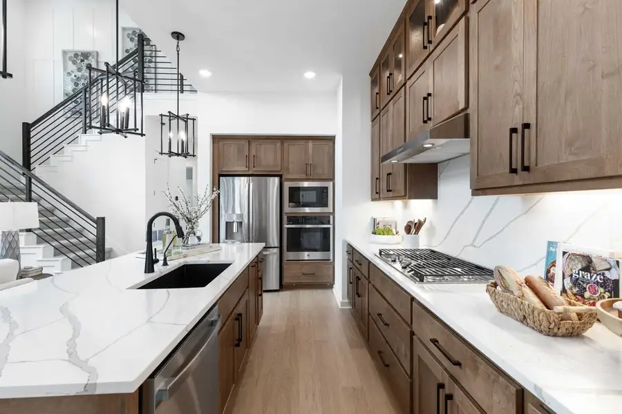 Representative furnished interior of a home built from the McLaren by Highland Homes in Meraki, Forney (Image 13).