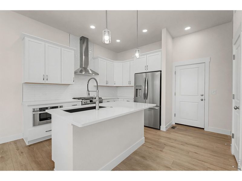 Furnished interior view inside a new home in The Lakes at Centerra - The Shores, Loveland (Image 10).