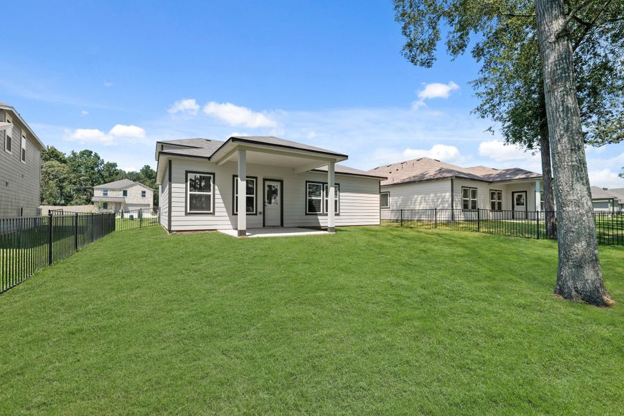 Front exterior of a new home in Lakes at Crockett Martin, Conroe, TX, highlighting curb appeal (Image 12). Front exterior of a new home in Lakes at Crockett Martin, Conroe, TX, highlighting curb appeal (Image 12).