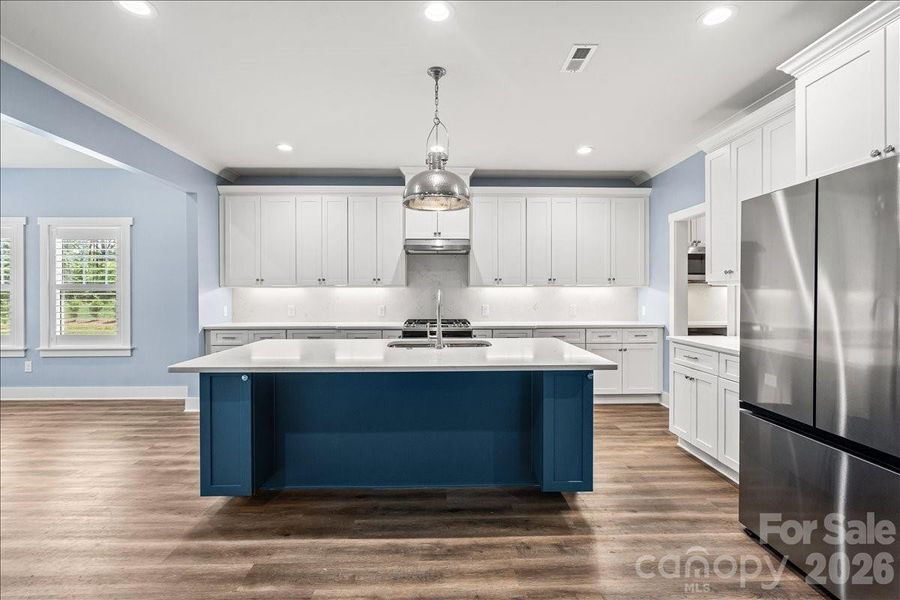 Large kitchen, quartz counters and backsplash, gas range, lots of cabinet space! Large kitchen, quartz counters and backsplash, gas range, lots of cabinet space!