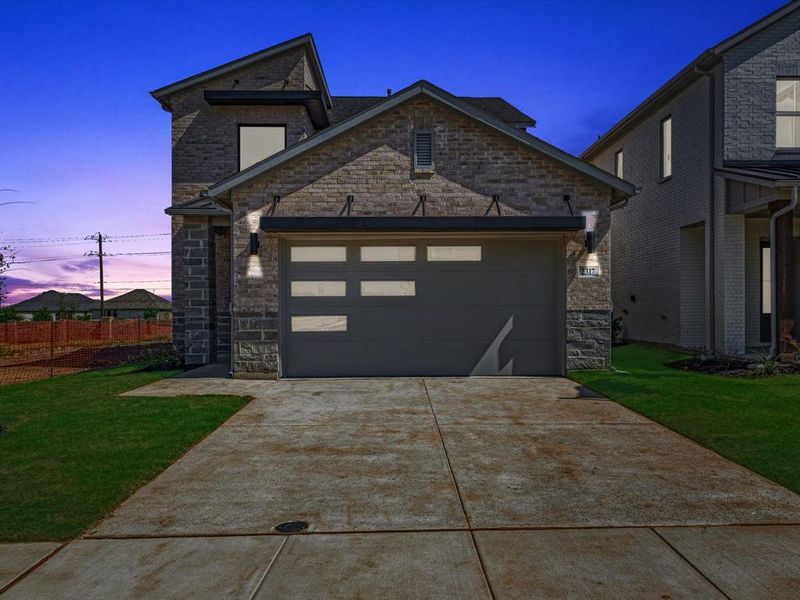 Front exterior of a new home in Royal Court, Little Elm, TX, highlighting curb appeal (Image 18).