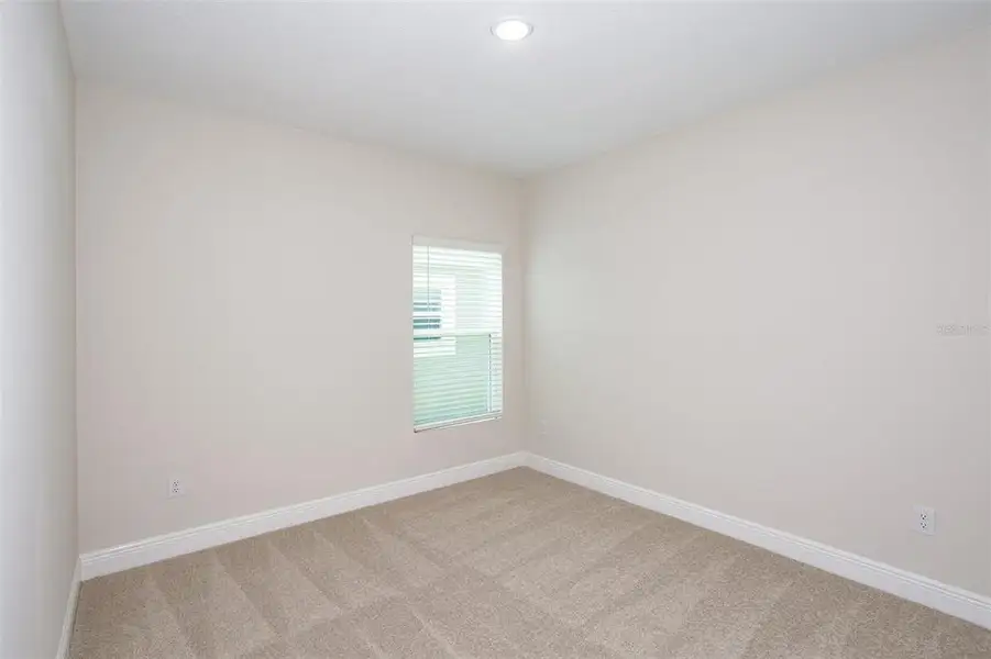 Spacious, unfurnished interior of a new home in Pasadena Landing, Wesley Chapel (Image 15).