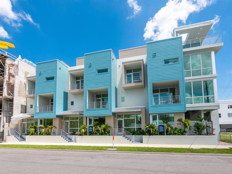 Front exterior of a new home in , Sarasota, FL, highlighting curb appeal (Image 38).