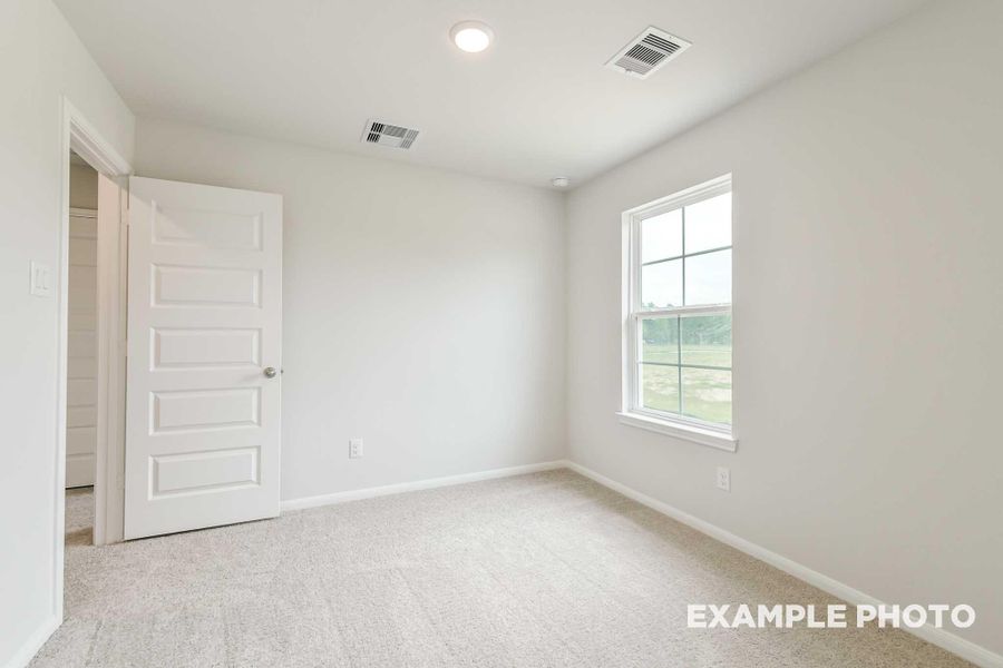 Spacious, unfurnished interior of a new home in Caney Creek Place, Conroe (Image 29).