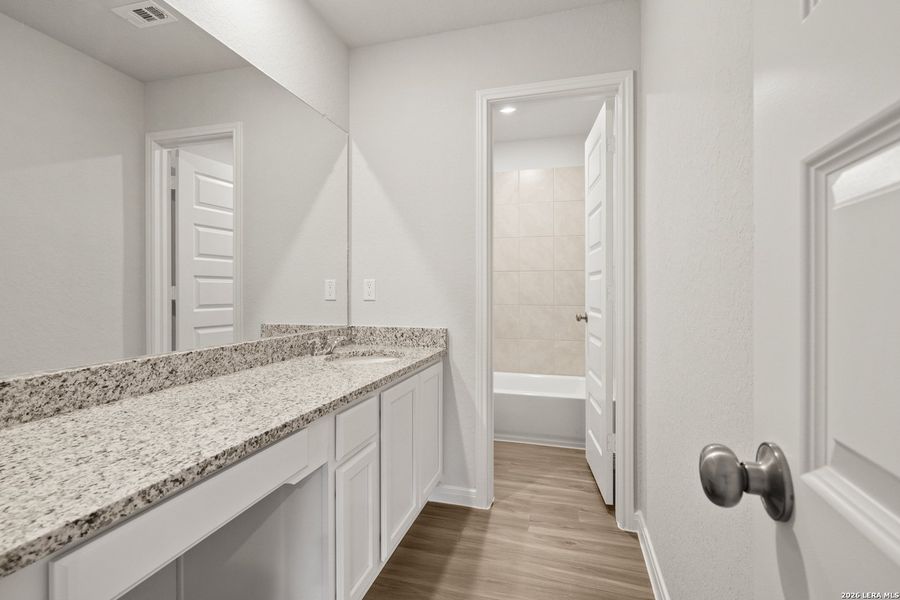 Furnished interior view inside a new home in Abbott Place, St. Hedwig (Image 11).