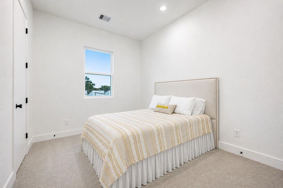 Also located on the third floor, the secondary bedroom offers the comfort and privacy of an ensuite bath and a generous walk-in closet. Also located on the third floor, the secondary bedroom offers the comfort and privacy of an ensuite bath and a generous walk-in closet.