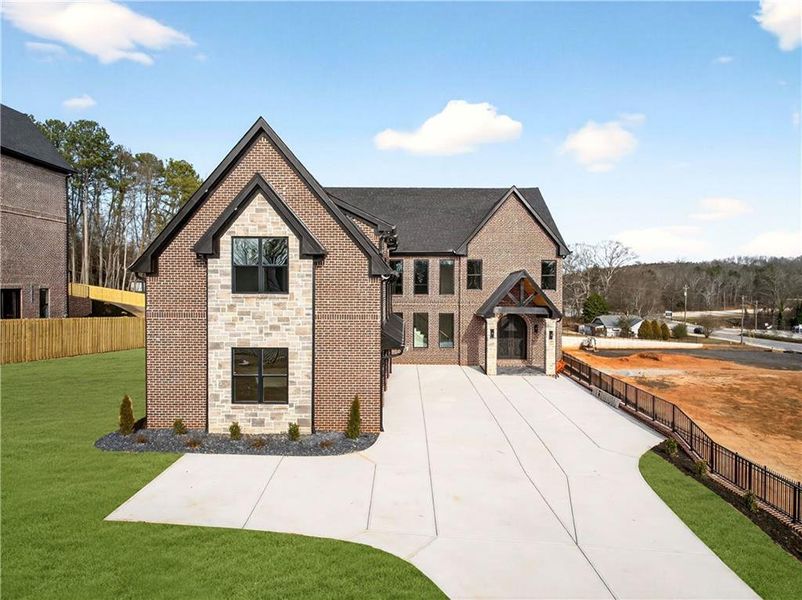 Front exterior of a new home in , Buford, GA, highlighting curb appeal (Image 30).