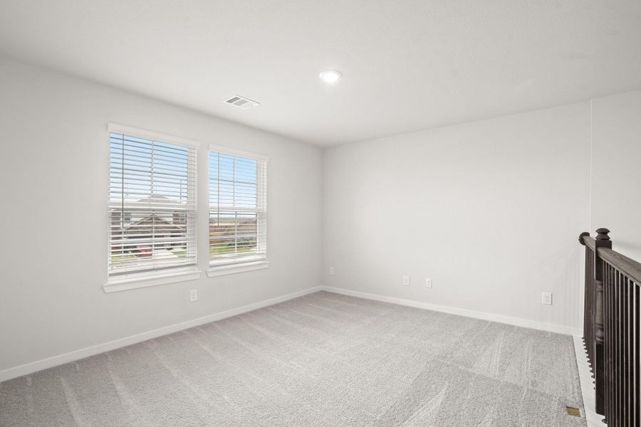 Spacious, unfurnished interior of a new home in Sunterra, Katy (Image 18).