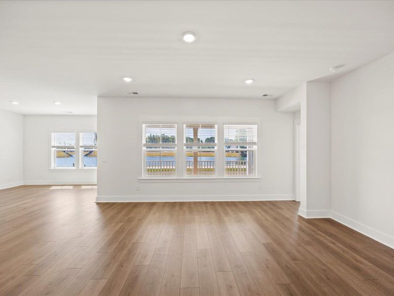 Spacious, unfurnished interior of a new home in The Coves at Lakes of Cane Bay II, Summerville (Image 30).