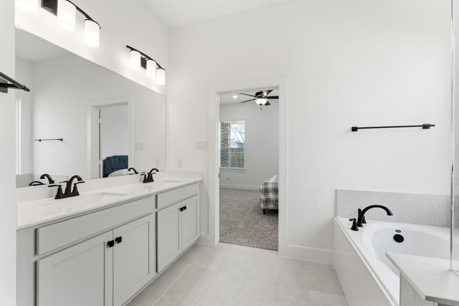 Furnished interior view inside a new home in Wood Leaf Reserve, Tomball (Image 9).