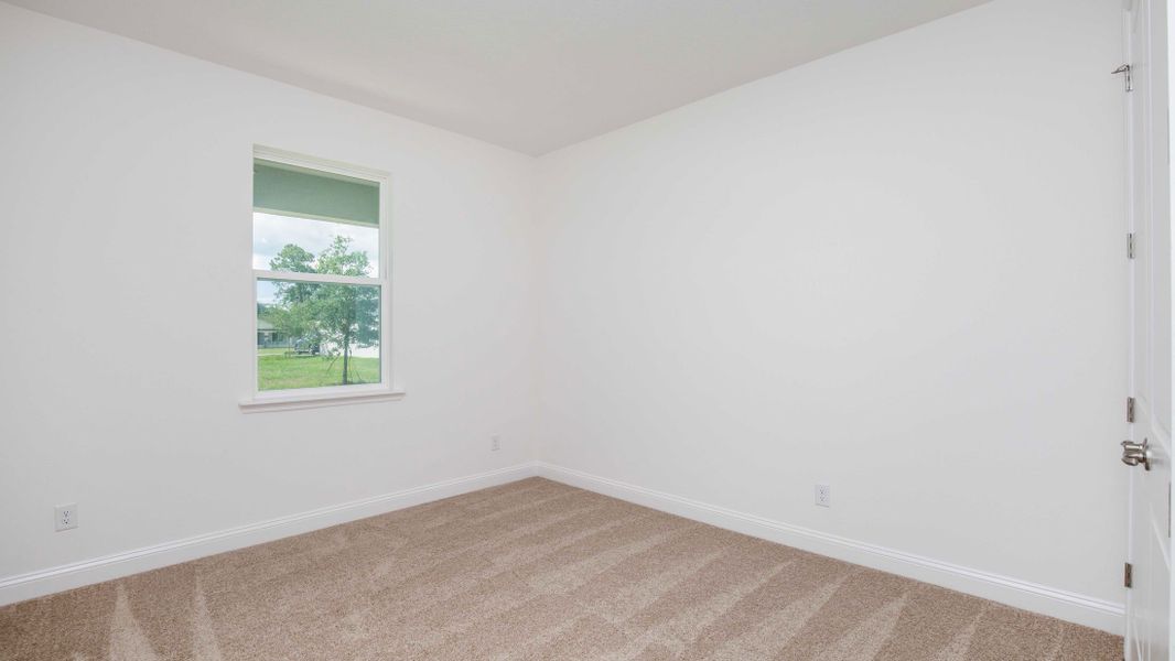 Representative unfurnished interior of a home built from the Naples by Maronda Homes in Golden Gate, Naples (Image 18).