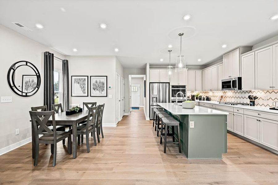 Representative furnished interior of a home built from the Roxbury Grande by Ryan Homes in Griffin Farm Townes, Pittsboro (Image 5).