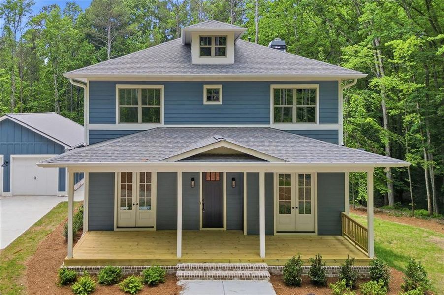 Front exterior of a new home in , Holly Springs, GA, highlighting curb appeal (Image 29). Front exterior of a new home in , Holly Springs, GA, highlighting curb appeal (Image 29).
