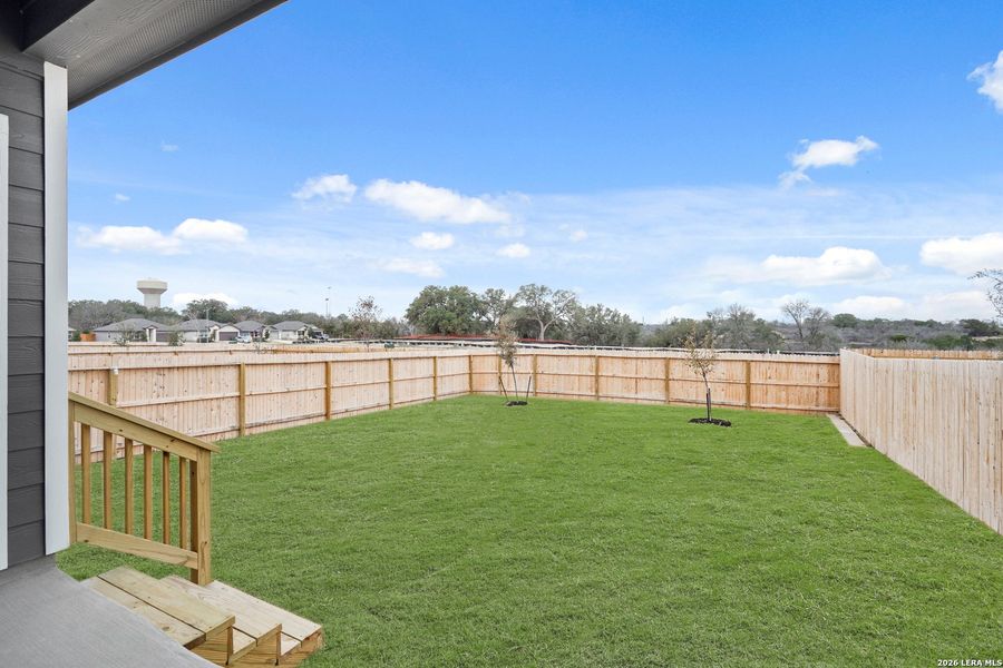 Exterior details and patio area of a home in Abbott Place, St. Hedwig (Image 3).