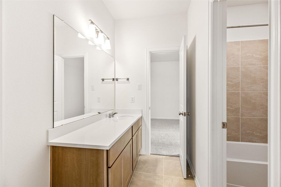 Furnished interior view inside a new home in Azalea, Pattison (Image 8).