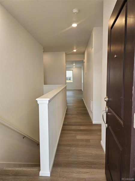 Spacious, unfurnished interior of a new home in The Cottages Collection at Ridgeline Vista, Brighton (Image 12).