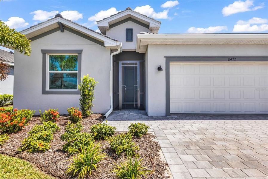 Exterior details and patio area of a home in Palm Lake at Coco Bay, Englewood (Image 25). Exterior details and patio area of a home in Palm Lake at Coco Bay, Englewood (Image 25).