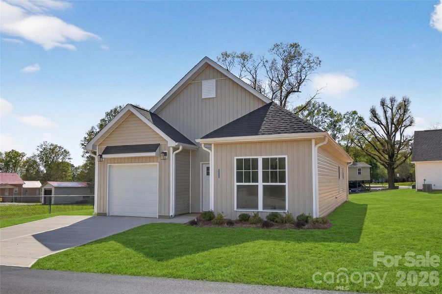 Front exterior of a new home in , Kannapolis, NC, highlighting curb appeal (Image 1). Front exterior of a new home in , Kannapolis, NC, highlighting curb appeal (Image 1).