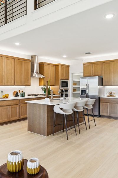 Kitchen in the Winters home plan by Trophy Signature Homes