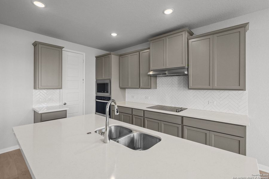 Furnished interior view inside a new home in Megan's Landing 50', Castroville (Image 11).