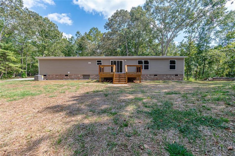 Exterior details and patio area of a home in , Dahlonega (Image 2).