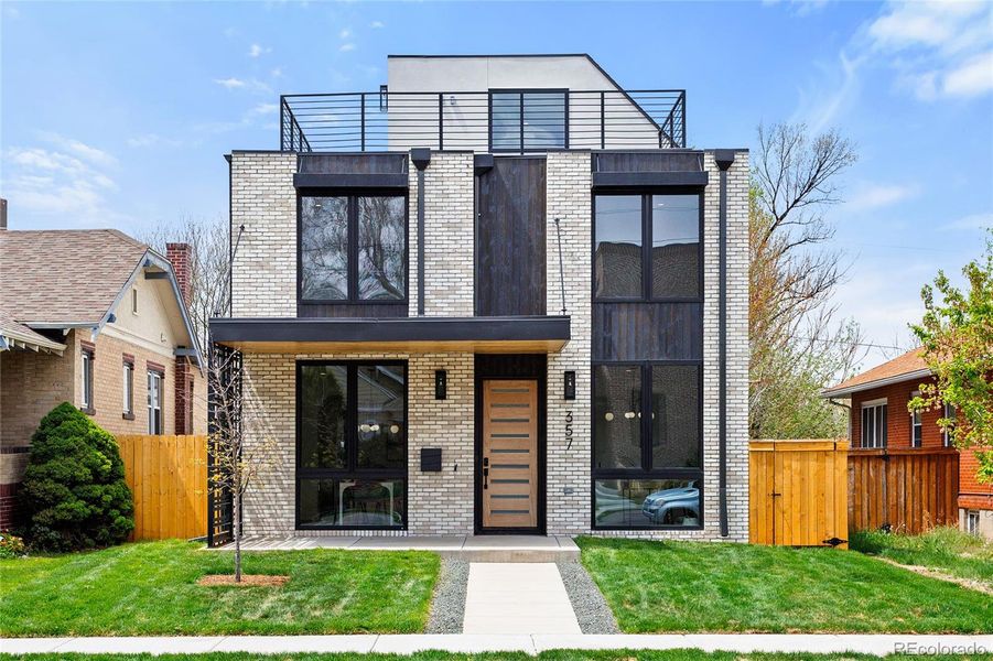 Front exterior of a new home in , Denver, CO, highlighting curb appeal (Image 27).