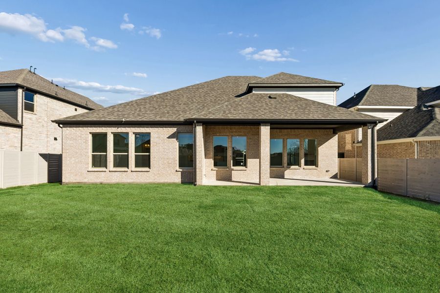 Exterior details and patio area of a home in Painted Tree Lakeside, McKinney (Image 4).
