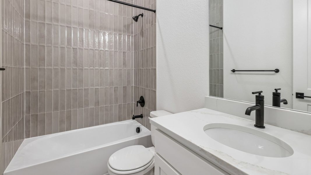 A stylish secondary bath for family and guests A stylish secondary bath for family and guests