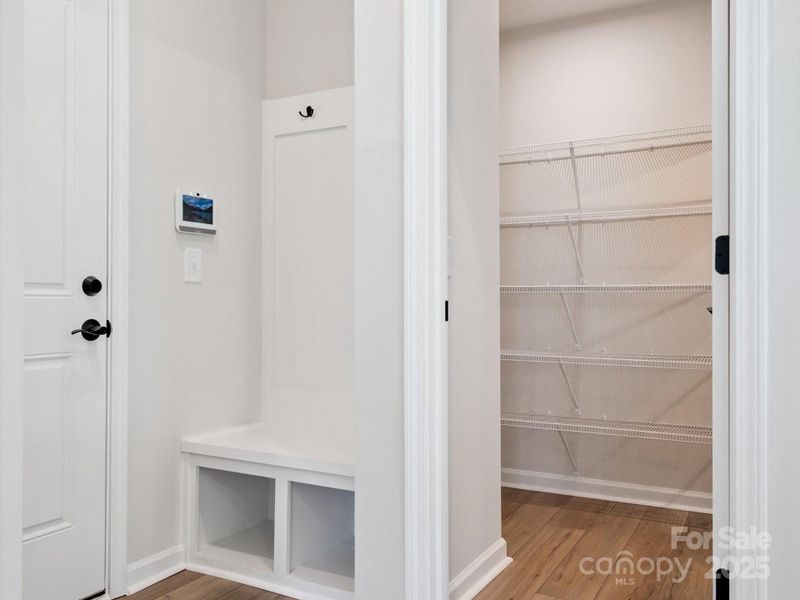 Built-In Drop Zone and Walk-In Pantry Because Storage Matters. *Model Photos | Actual Finishes, Structural Selections, and Orientation May Vary. Built-In Drop Zone and Walk-In Pantry Because Storage Matters. *Model Photos | Actual Finishes, Structural Selections, and Orientation May Vary.