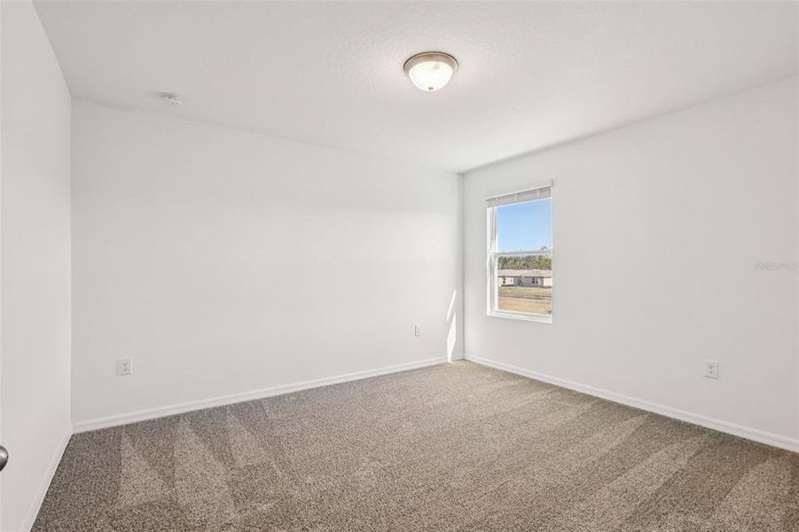 Spacious, unfurnished interior of a new home in Lake Deer Estates - Classic Series, Poinciana (Image 28).