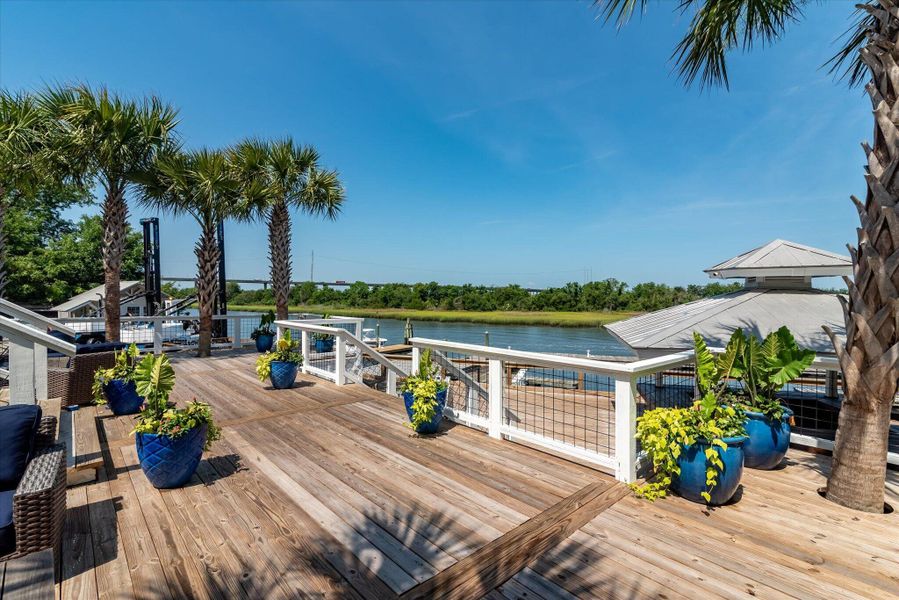 Exterior details and patio area of a home in The Bluffs at Pinefield Townhomes, Charleston (Image 2). Exterior details and patio area of a home in The Bluffs at Pinefield Townhomes, Charleston (Image 2).