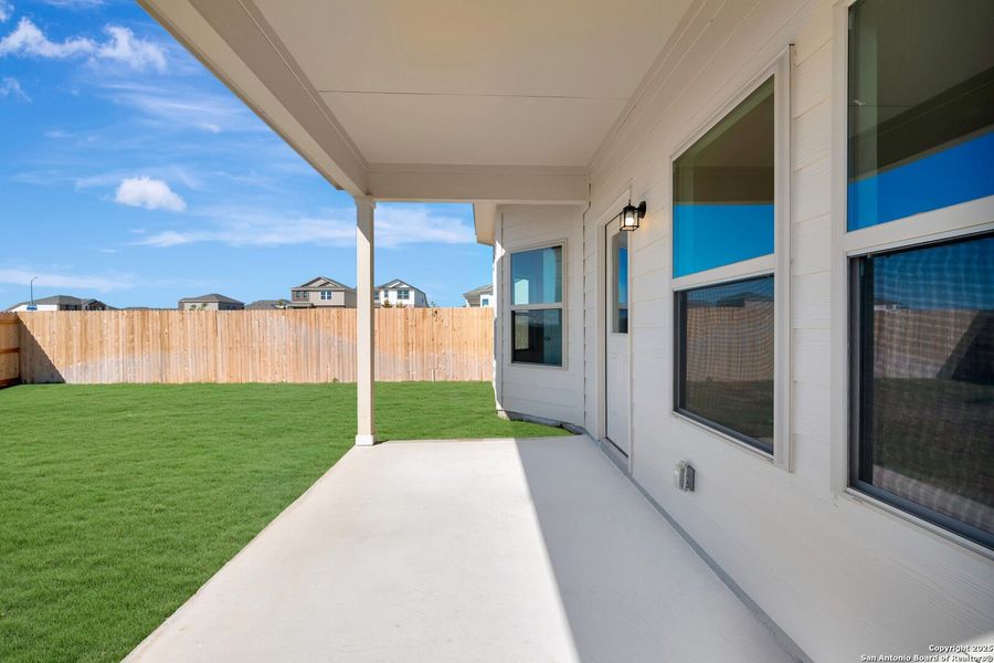 Exterior details and patio area of a home in Paloma Park, Converse (Image 21).