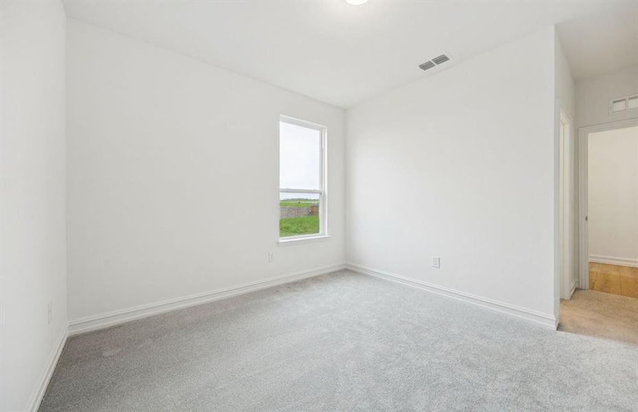 Secondary bedroom designed for comfort and convenience