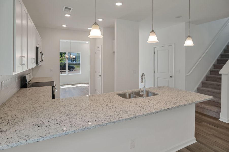 Furnished interior view inside a new home in Marlin Pointe, White House (Image 3).
